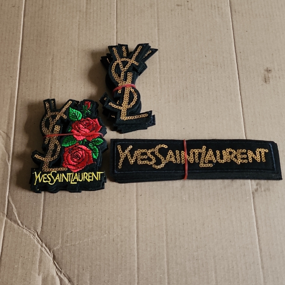 Yves Saint Laurent Black and Gold Patch Set with Red Roses